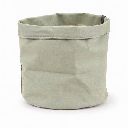 Lichtgroene stoffen plantbag Jade met omgevouwen rand, diameter 22 cm, leeg op een witte achtergrond.